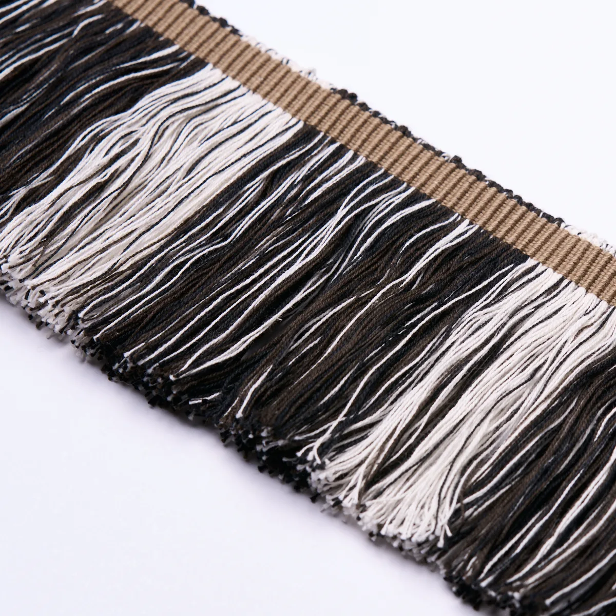 78987 | Calcada Fringe - Carbon Schumacher Calcada Fringe trim in Carbon (78987)