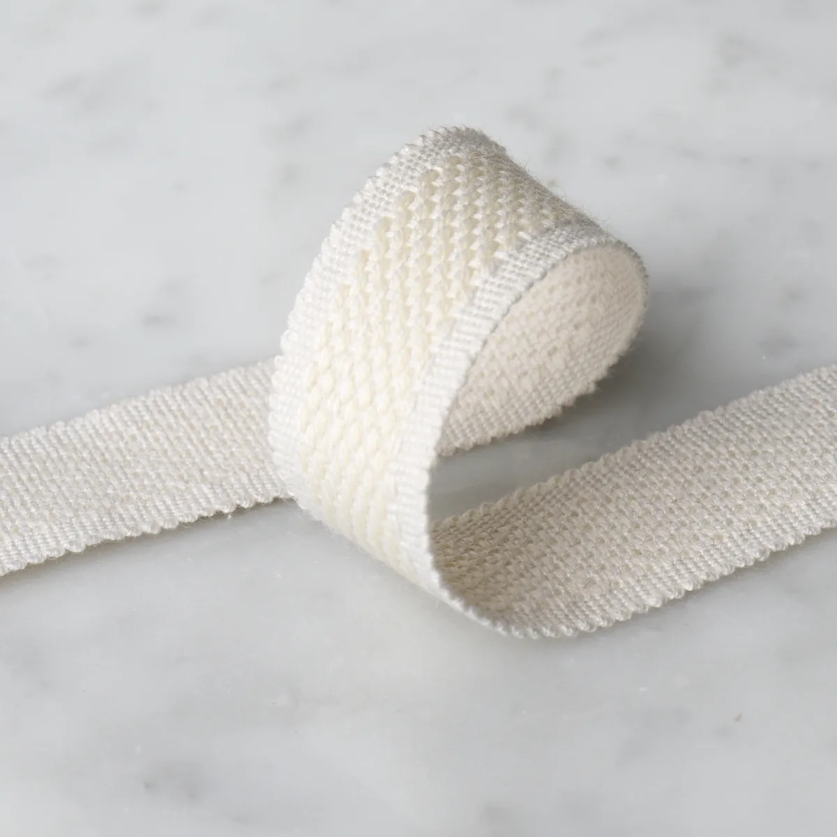 83390 | Cardiff Tape Medium - Ivory Schumacher Cardiff Tape Medium trim in Ivory (83390)