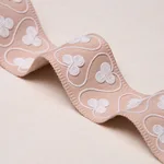 72746 | Coquette Tape - Blush Schumacher Coquette Tape trim in Blush (72746)
