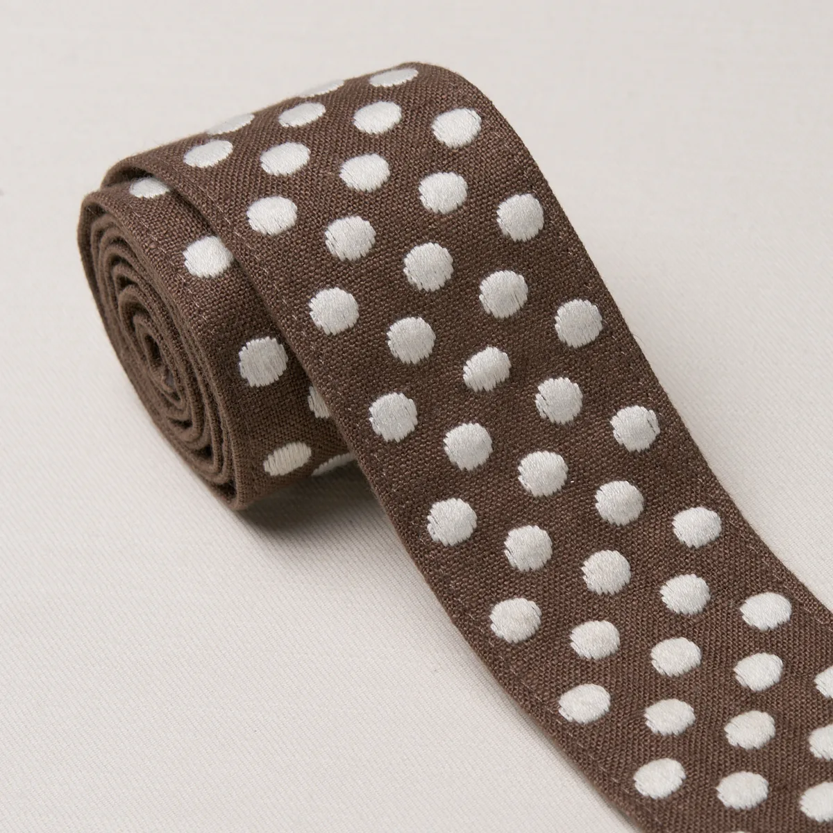 86294 | Dotted Embroidered Tape - Brown Schumacher Dotted Embroidered Tape trim in Brown (86294)
