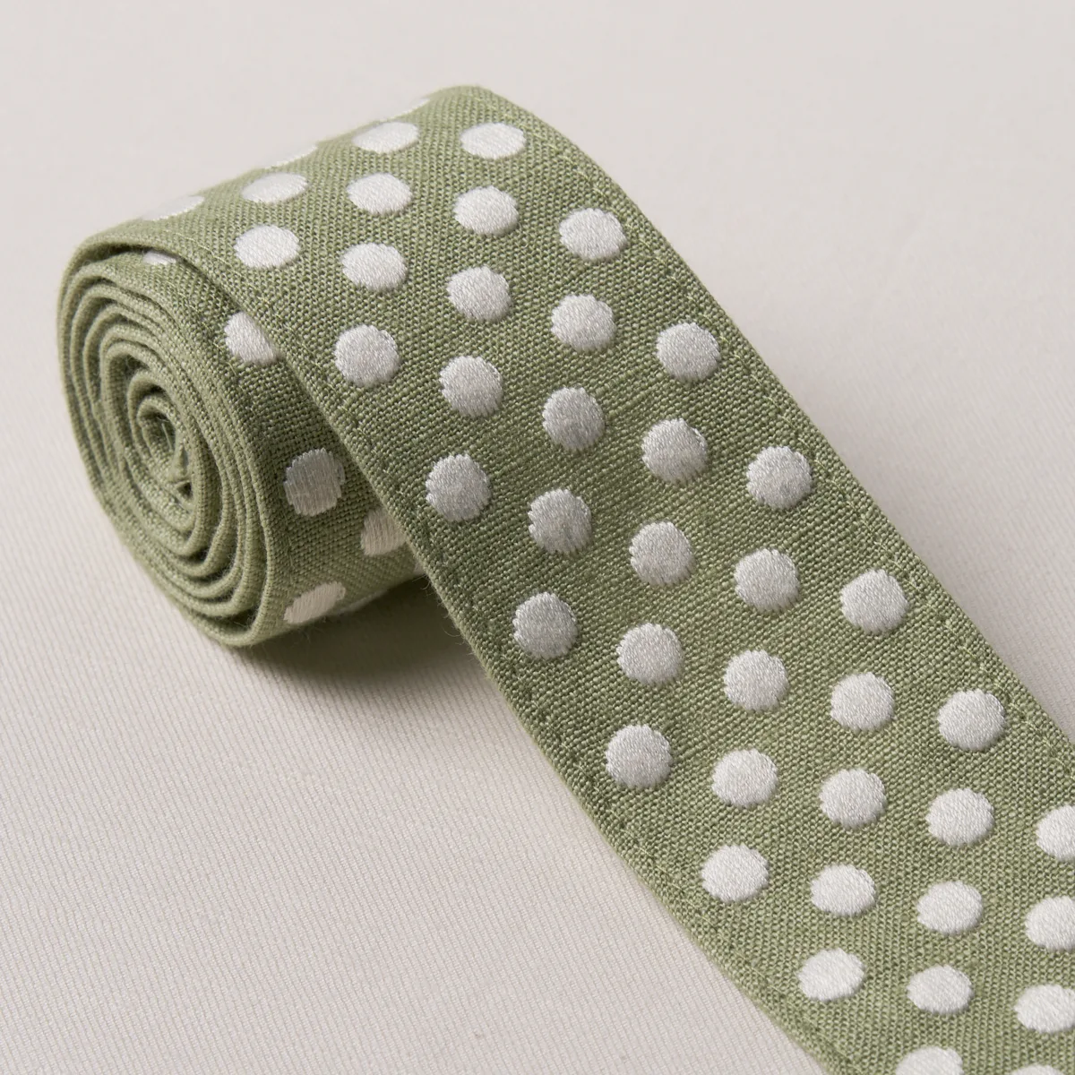 86293 | Dotted Embroidered Tape - Sage Schumacher Dotted Embroidered Tape trim in Sage (86293)