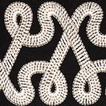 76733 | Freeform Embroidered Tape - Black Schumacher Freeform Embroidered Tape trim in Black (76733)
