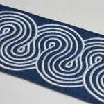 81253 | Giraldi Embroidered Trim - White on Navy Schumacher Giraldi Embroidered Trim in White on Navy (81253)