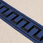 70803 | Greek Key Embroidered Tape - Black on Navy Schumacher Greek Key Embroidered Tape trim in Black on Navy (70803)