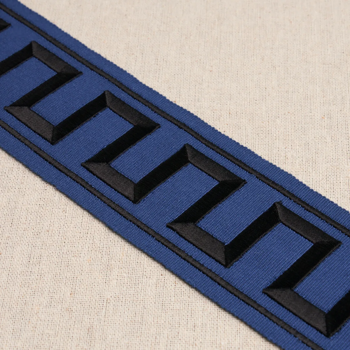 70803 | Greek Key Embroidered Tape - Black on Navy Schumacher Greek Key Embroidered Tape trim in Black on Navy (70803)
