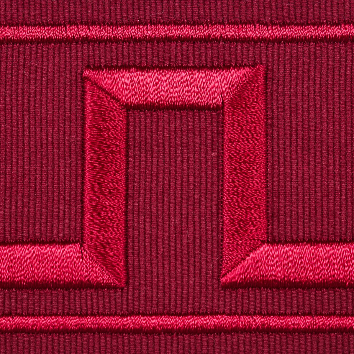 70805 | Greek Key Embroidered Tape - Burgundy Schumacher Greek Key Embroidered Tape trim in Burgundy (70805)