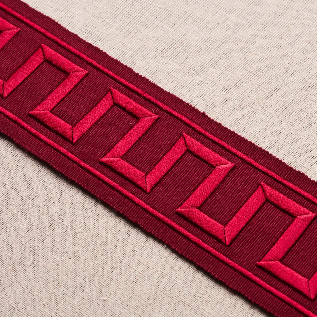 70805 | Greek Key Embroidered Tape - Burgundy Schumacher Greek Key Embroidered Tape trim in Burgundy (70805)