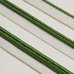 74558 | Gustave Silk Lip Cord Medium - Green Schumacher Gustave Silk Lip Cord Medium trim in Green (74558)