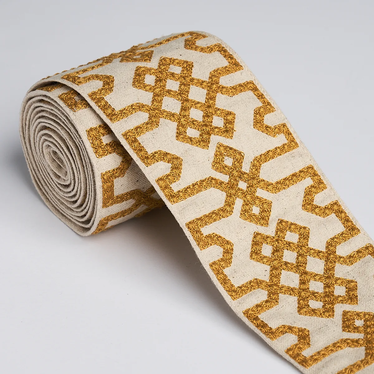 Schumacher Knotted Trellis Tape trim in Ocher on Unbleached (80882)