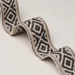 77464 | Larson Handwoven Tape - Brown Schumacher Larson Handwoven Tape trim in Brown (77464)
