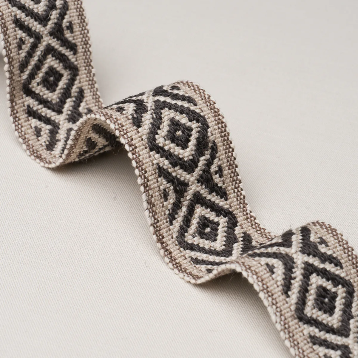 77464 | Larson Handwoven Tape - Brown Schumacher Larson Handwoven Tape trim in Brown (77464)