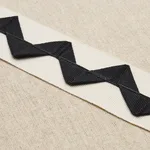 82243 | Lazare Appliqué Tape - Black on Ivory Schumacher Lazare Appliqué Tape trim in Black on Ivory (82243)