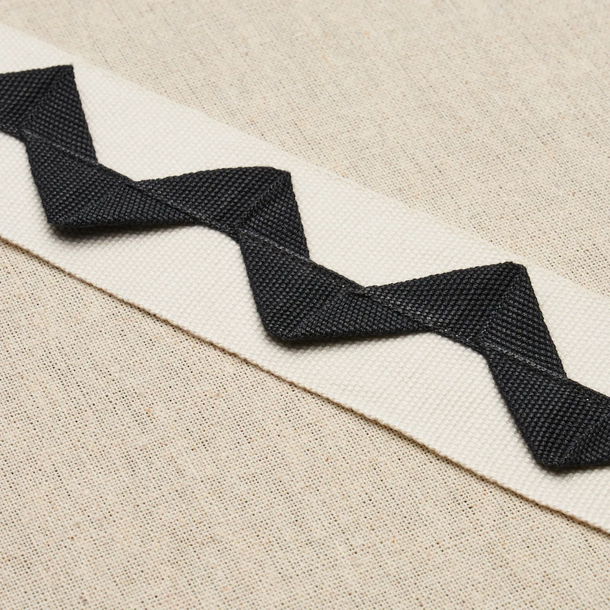 82243 | Lazare Appliqué Tape - Black on Ivory Schumacher Lazare Appliqué Tape trim in Black on Ivory (82243)