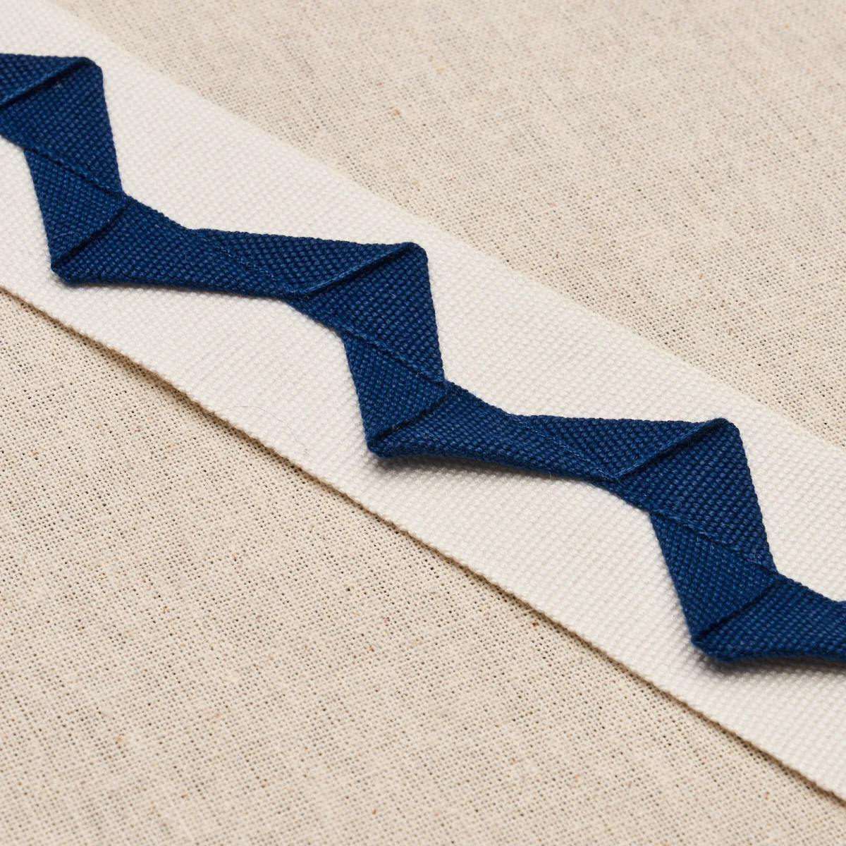82241 | Lazare Appliqué Tape - Navy on Ivory Schumacher Lazare Appliqué Tape trim in Navy on Ivory (82241)