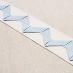 82240 | Lazare Appliqué Tape - Sky on Ivory Schumacher Lazare Appliqué Tape trim in Sky on Ivory (82240)