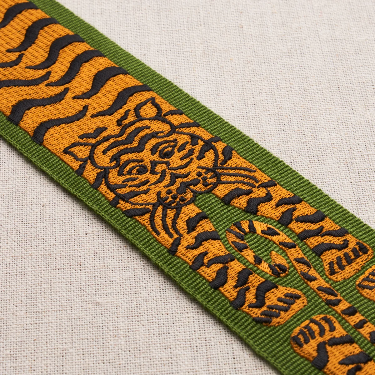 82511 | Le Tigre Embroidered Trim - Green Schumacher Le Tigre Embroidered Trim in Green (82511)