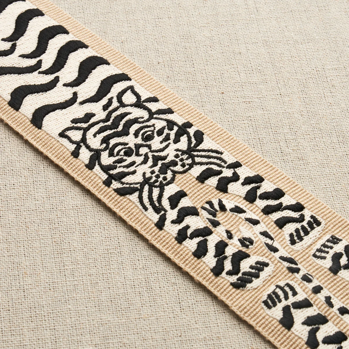 82510 | Le Tigre Embroidered Trim - Neutral Schumacher Le Tigre Embroidered Trim in Neutral (82510)