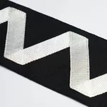 80871 | Legere Appliqué Tape - Ivory on Black Schumacher Legere Appliqué Tape trim in Ivory on Black (80871)