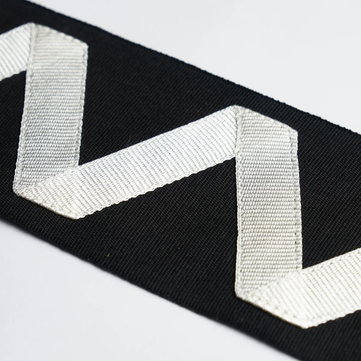 80871 | Legere Appliqué Tape - Ivory on Black Schumacher Legere Appliqué Tape trim in Ivory on Black (80871)
