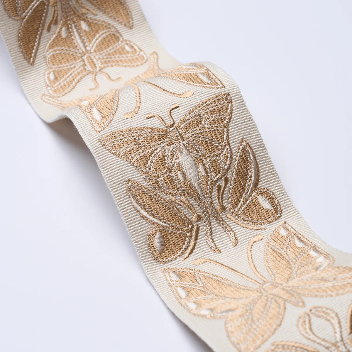 84381 | Metamorphosis Tape - Ivory & Gold Schumacher Metamorphosis Tape trim in Ivory & Gold (84381)