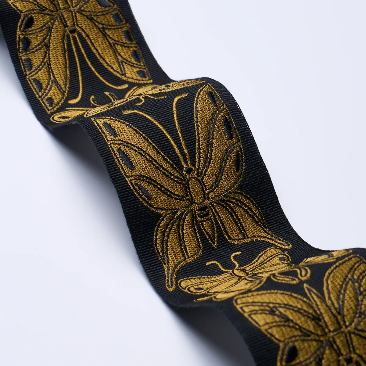 84380 | Metamorphosis Tape - Noir & Gold Schumacher Metamorphosis Tape trim in Noir & Gold (84380)