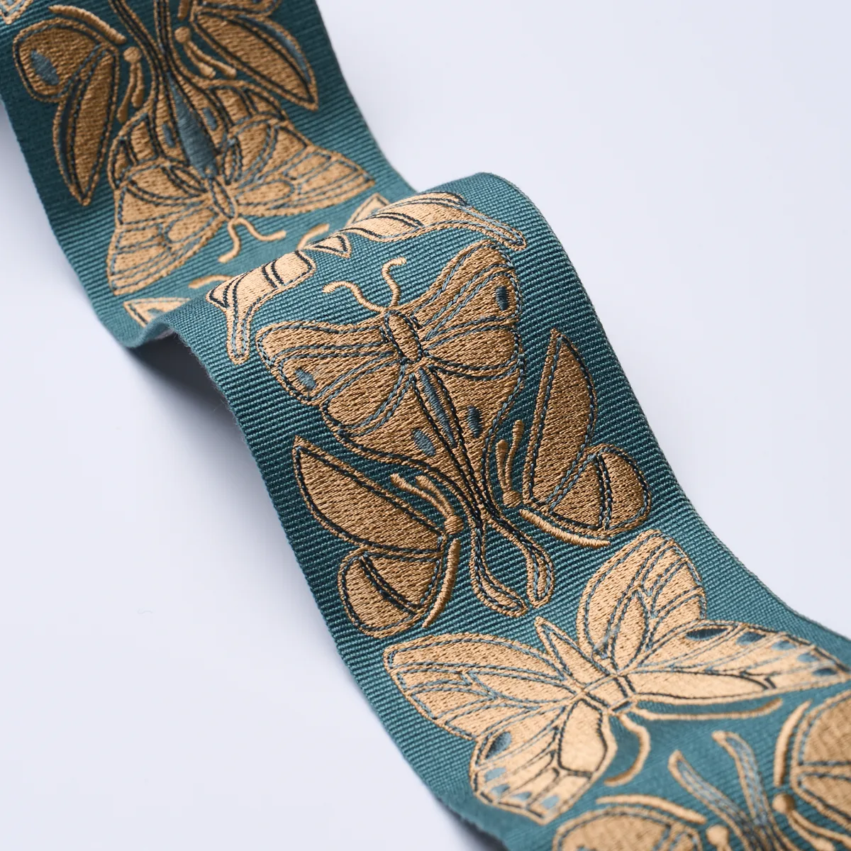 84382 | Metamorphosis Tape - Teal & Gold Schumacher Metamorphosis Tape trim in Teal & Gold (84382)