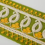 81232 | Paisley Embroidered Tape - Green & Yellow Schumacher Paisley Embroidered Tape trim in Green & Yellow (81232)