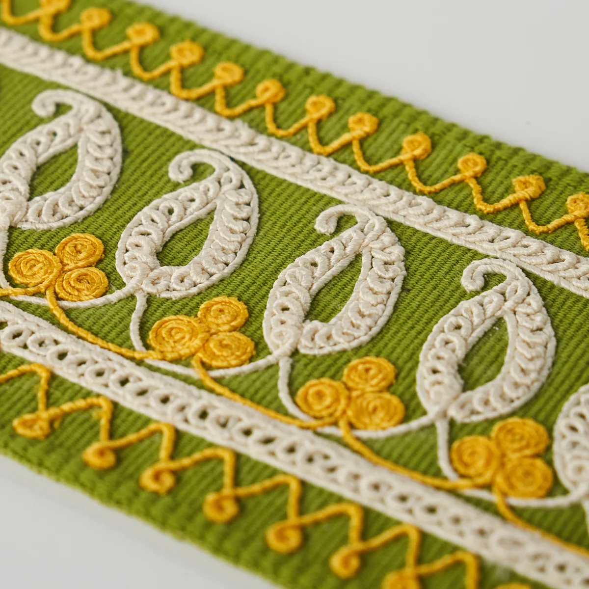 81232 | Paisley Embroidered Tape - Green & Yellow Schumacher Paisley Embroidered Tape trim in Green & Yellow (81232)