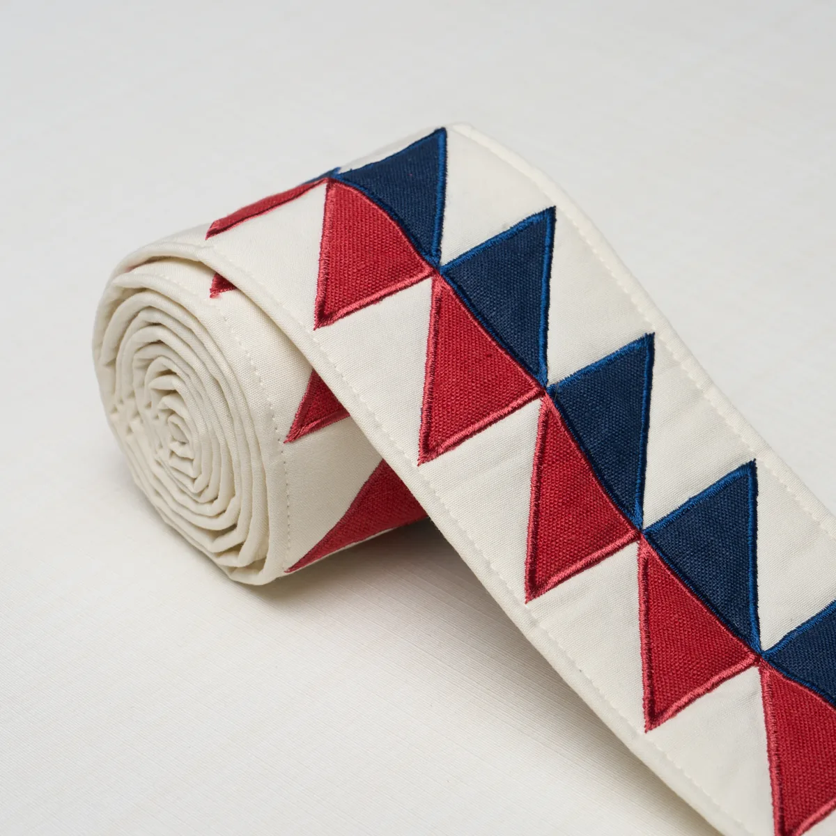 Schumacher Quilted Diamond Tape trim in Americana (87581)