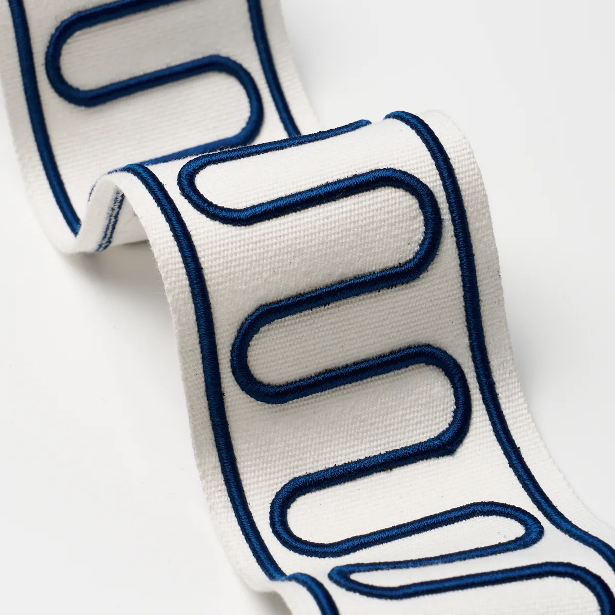 84620 | Royere Scroll - Marine Schumacher Royere Scroll trim in Marine (84620)