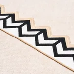 83610 | Sparren Embroidered Tape - Black Schumacher Sparren Embroidered Tape trim in Black (83610)