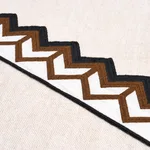 83611 | Sparren Embroidered Tape - Brown Schumacher Sparren Embroidered Tape trim in Brown (83611)