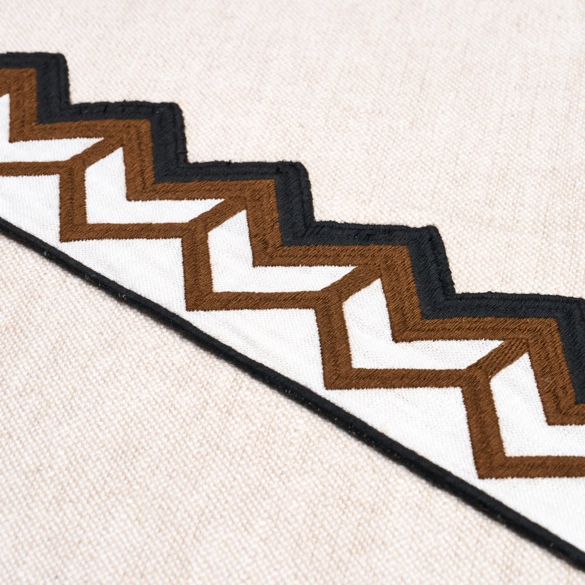 83611 | Sparren Embroidered Tape - Brown Schumacher Sparren Embroidered Tape trim in Brown (83611)