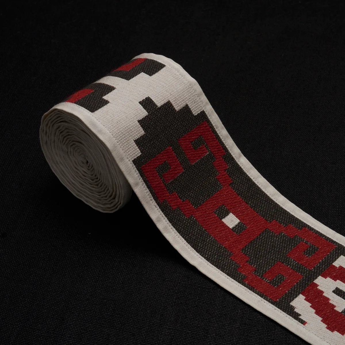 87042 | Storm Pattern Tape - Red Schumacher Storm Pattern Tape trim in Red (87042)