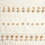 69312 | Tahiti Tape - Ivory Schumacher Tahiti Tape trim in Ivory (69312)