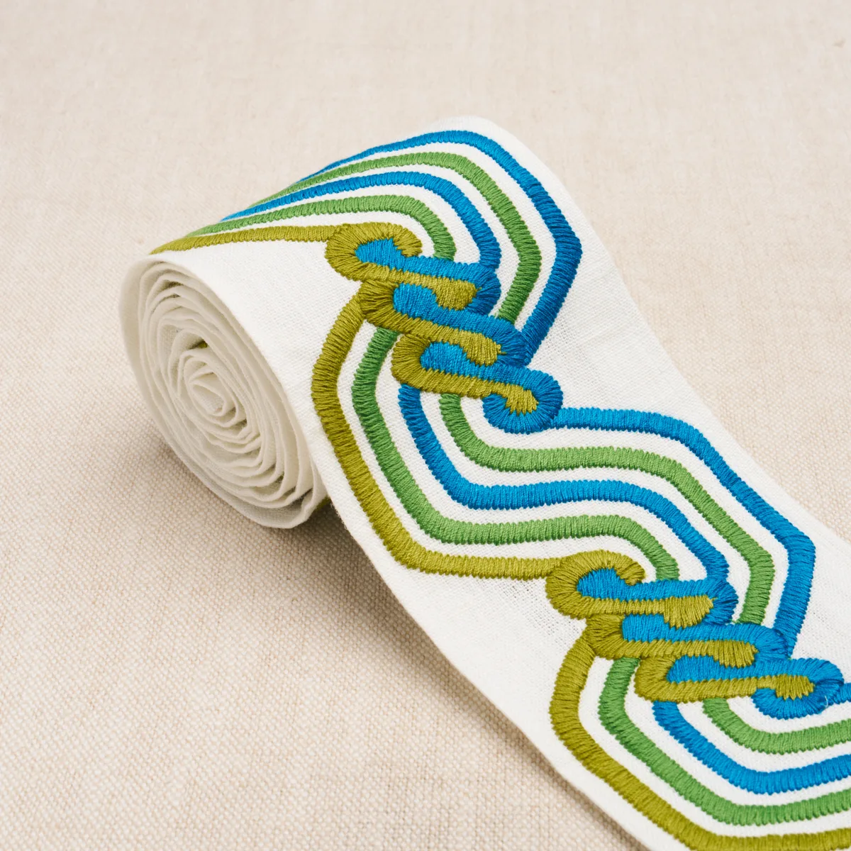 83631 | The Twist Embroidered Tape - Peacock Schumacher The Twist Embroidered Tape trim in Peacock (83631)