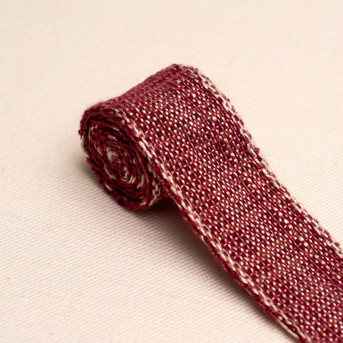 86205 | Tweed Tape Narrow - Red Schumacher Tweed Tape Narrow trim in Red (86205)