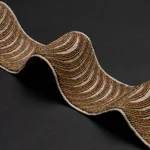 85571 | Ziegfeld Hand Beaded Tape - Gilt Schumacher Ziegfeld Hand Beaded Tape trim in Gilt (85571)