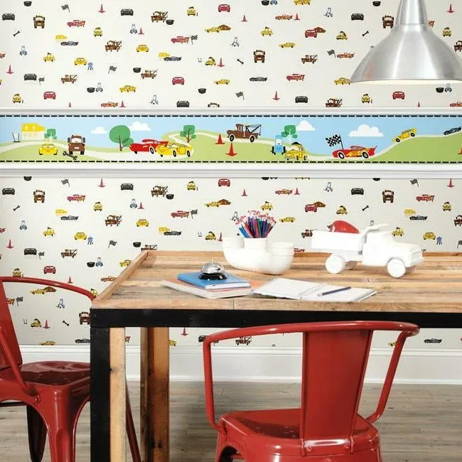 York Wallcoverings Disney & Pixar Cars Racing Spot Cream Wallpaper | Wallpaper Twins York Wallcoverings Disney & Pixar Cars Racing Spot Cream Wallpaper - SKU DI0922