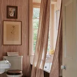 House of Hackney Artist's Stripe Wallpaper in Sakura & Astrantia House of Hackney Artist's Stripe wallpaper in Sakura & Astrantia, foliage and stripes in sakura & astrantia