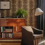 House of Hackney Caspian Wallpaper in Umber House of Hackney Caspian wallpaper in Umber, animal markings and stripes in umber