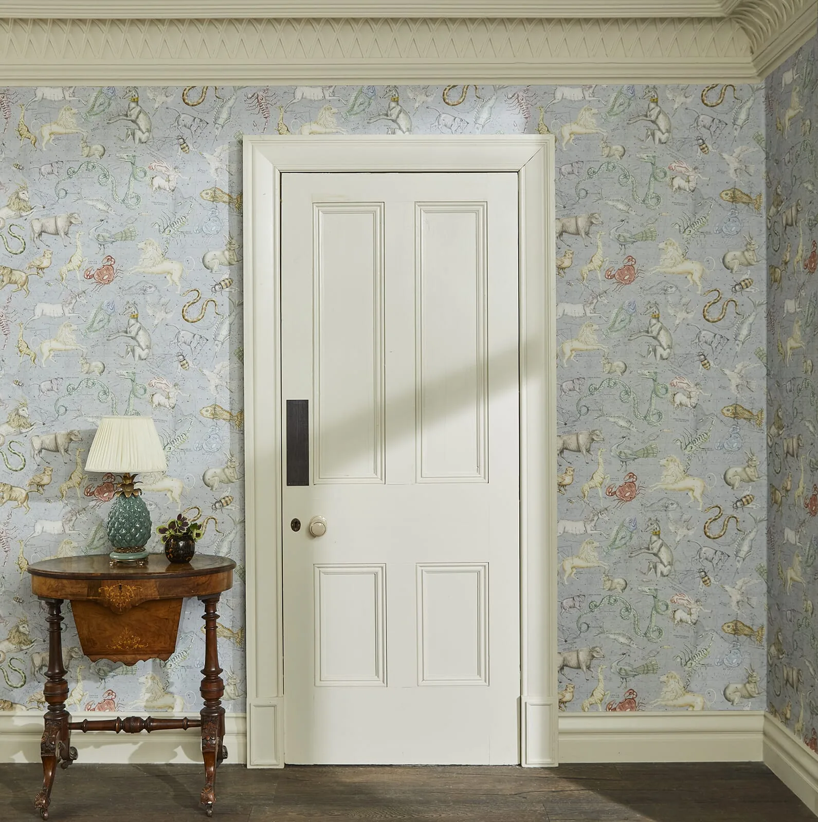 House of Hackney Cosmos wallpaper in Celestial Blue, animal markings and celestial motifs in blue