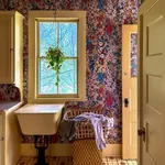 House of Hackney Hollyhocks Wallpaper in Autumn House of Hackney Hollyhocks wallpaper in Autumn, blooms and foliage in autumn