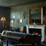 House of Hackney Opia wallpaper in Petrol, blooms and foliage in petrol