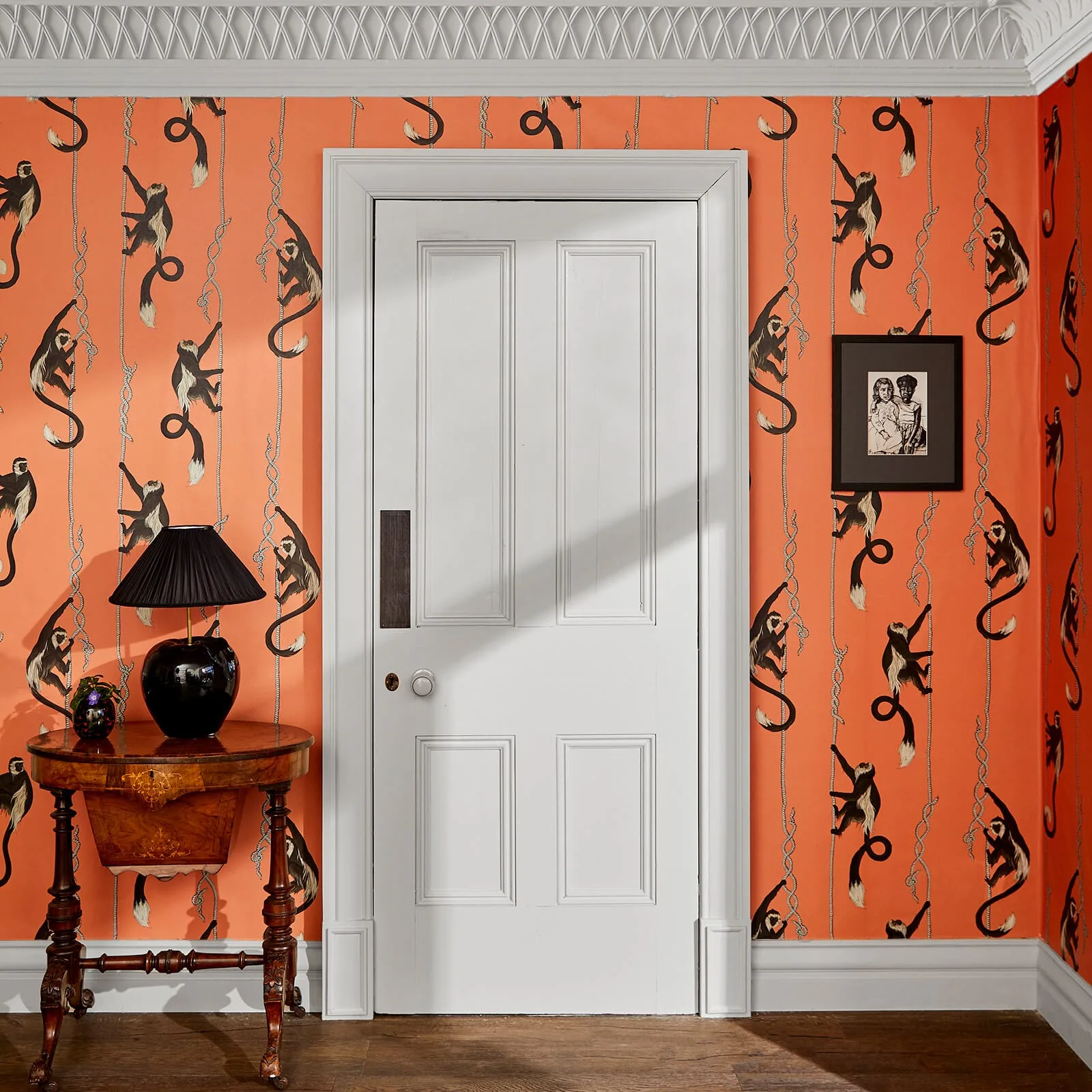 House of Hackney Troop wallpaper in Salamander Orange, animal markings and geometric forms in salamander orange