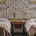 House of Hackney Voysey's Garden Magna wallpaper in Off White, blooms and foliage in white